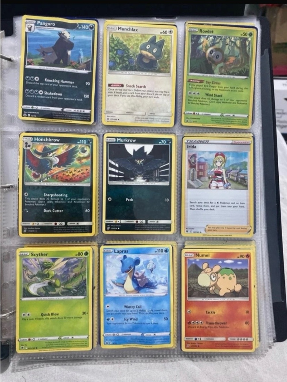 Pokémon Trading Card Lot - Assorted Green, Blue, Yellow, Black & Brown Cards
